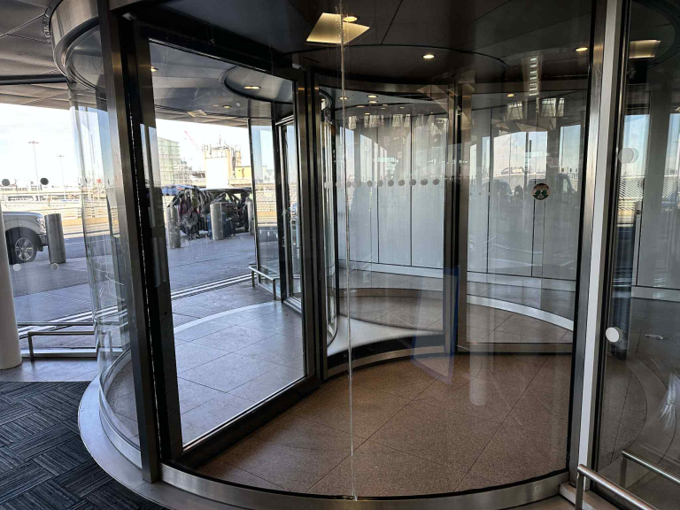 Interior view of a Boon Edam Tournex revolving door at an NYC commercial entrance